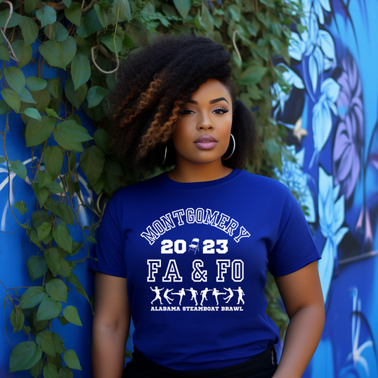 Woman wearing a blue t-shirt with text and numbers, standing against a blue wall with greenery.